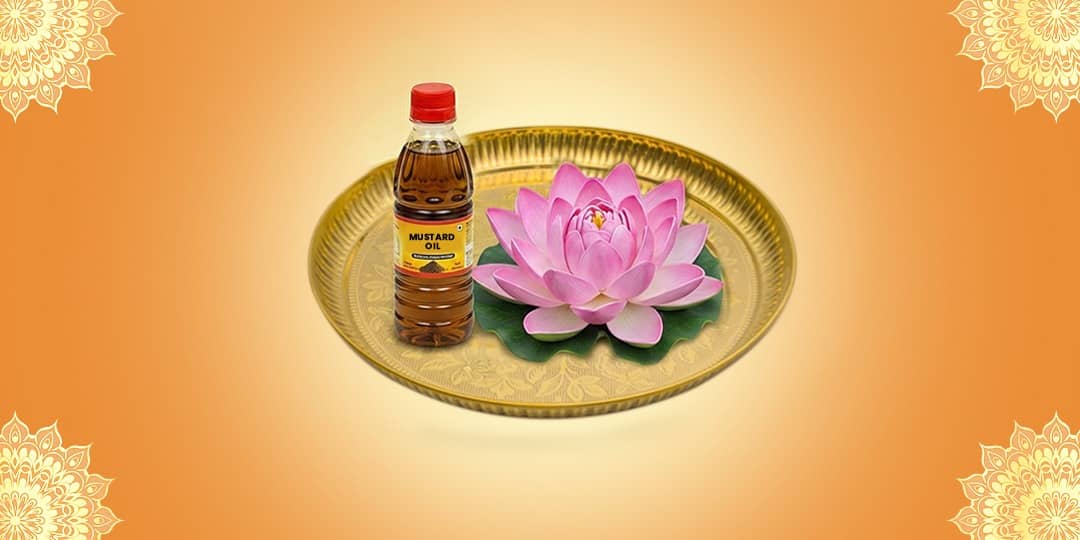 Offer Mustard Oil (Batuk Bhairav) and Lotus (Maa Lakshmi)