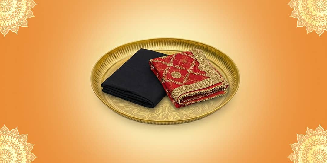 Offer Black Cloth (Batuk Bhairav) and Red Chunari (Maa Lakshmi)