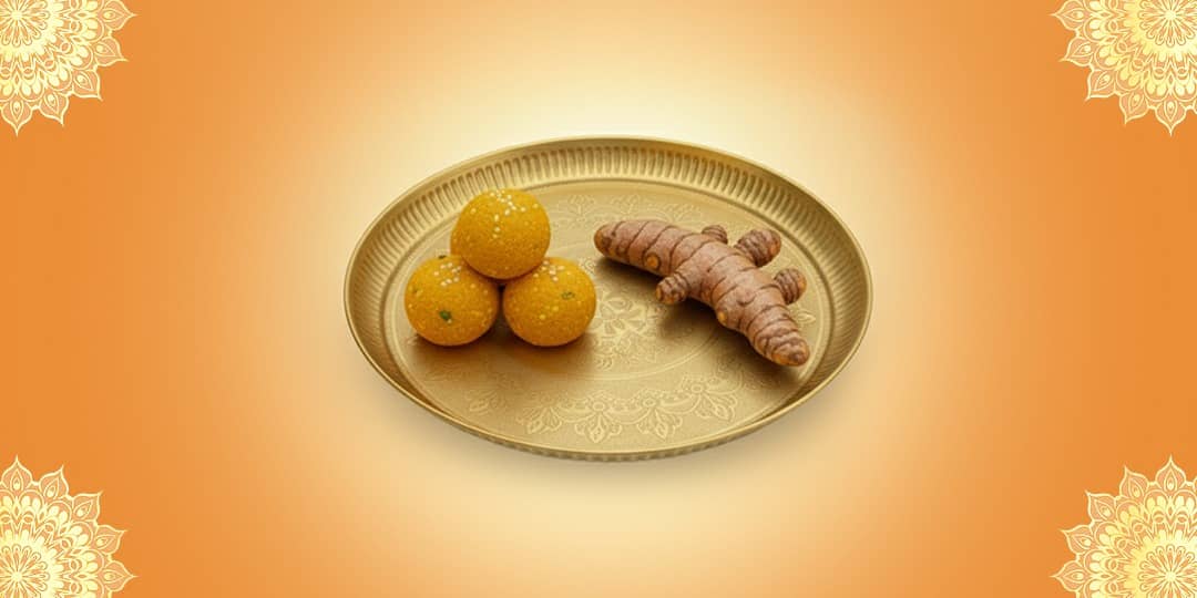Offer Besan Ladoo and Turmeric Root